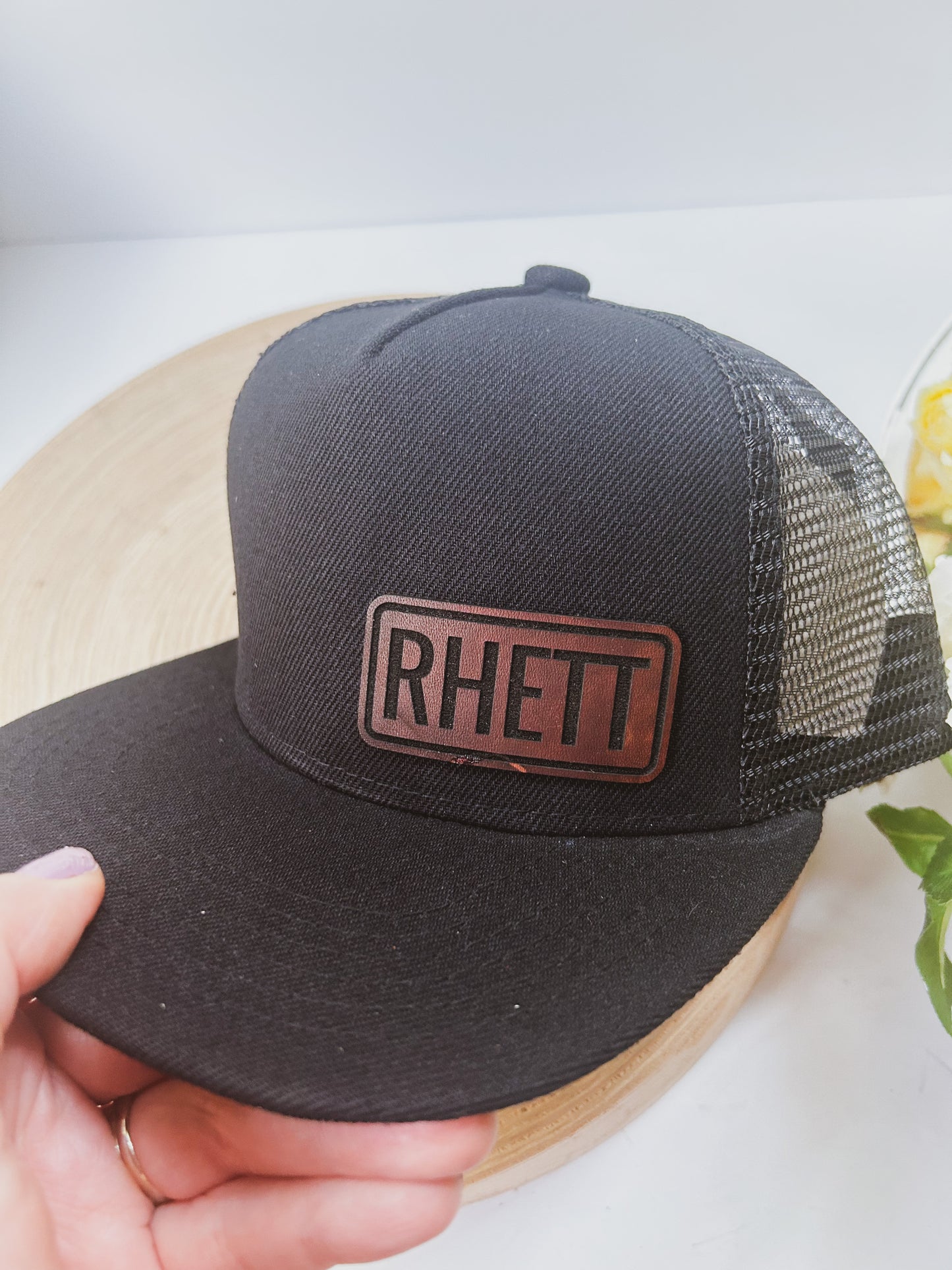 Personalized Leather Patch with Kids Name on Black Trucker Hat