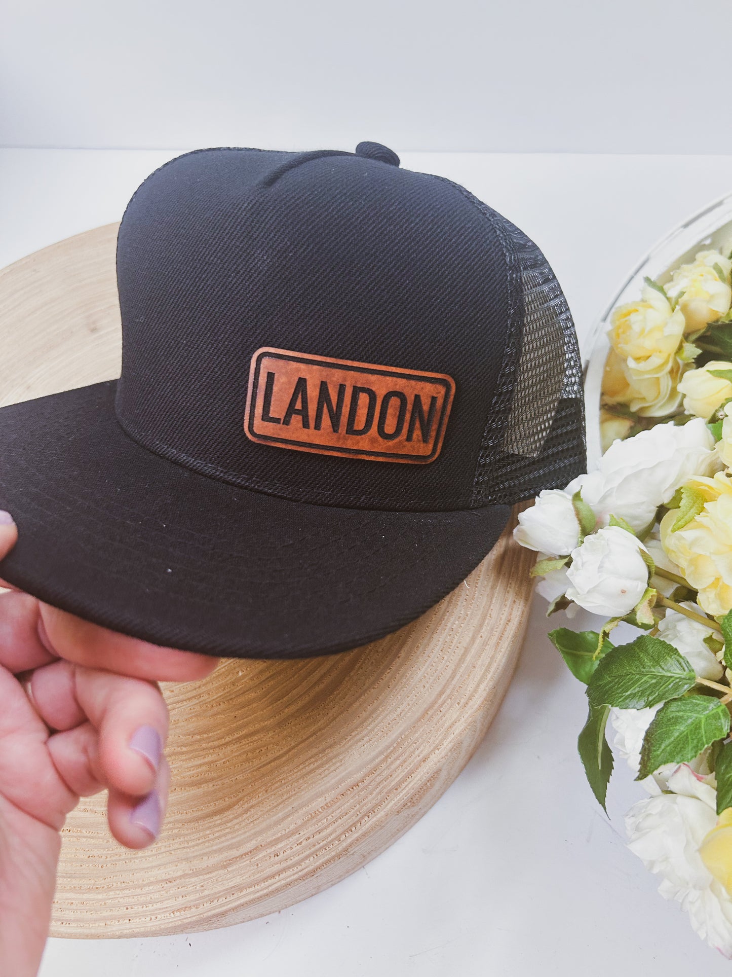 Personalized Leather Patch with Kids Name on Black Trucker Hat