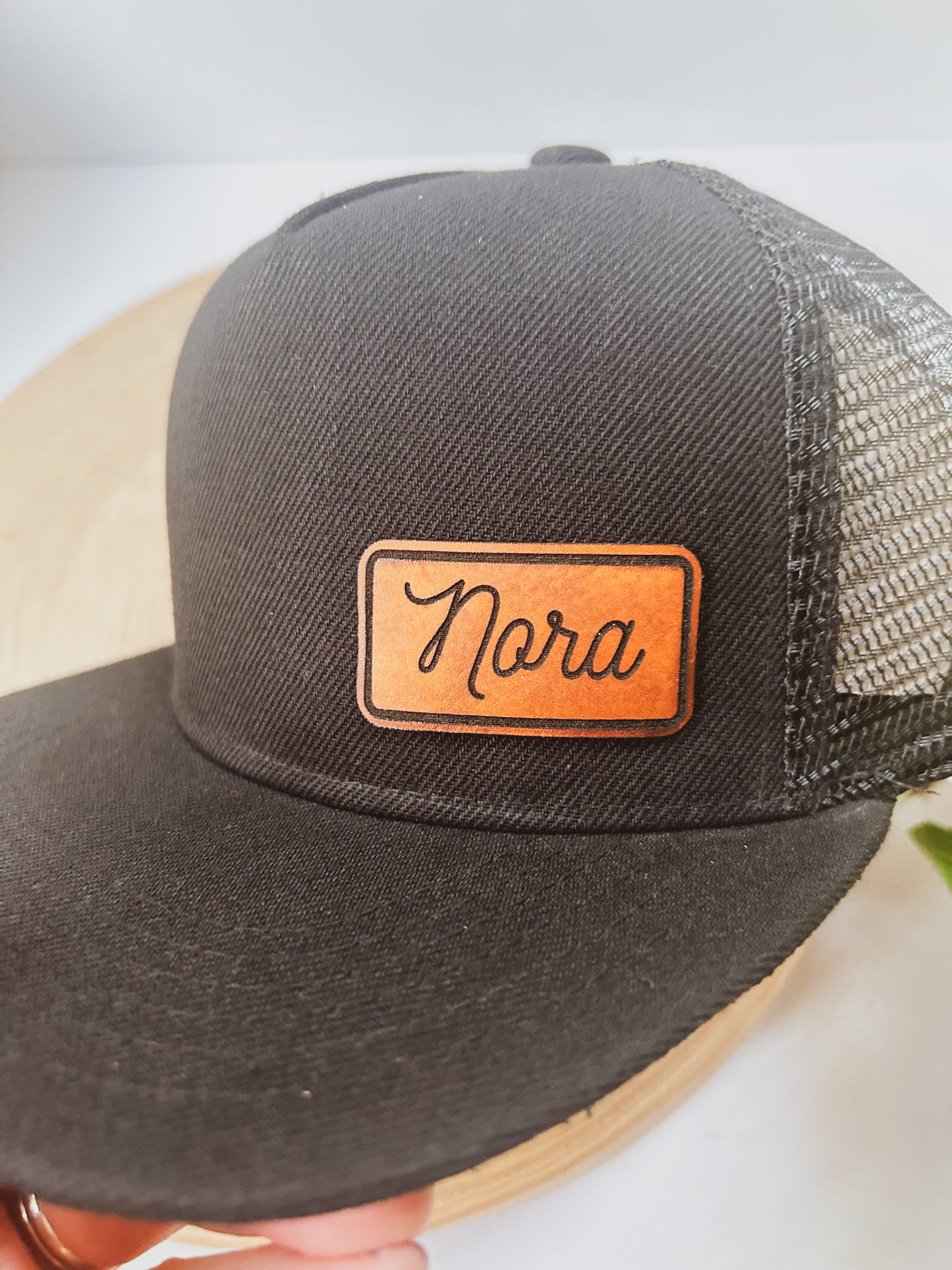 Personalized Leather Patch with Kids Name on Black Trucker Hat