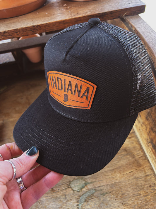 Rectangular Indiana Leather Patch on Black Trucker Hat