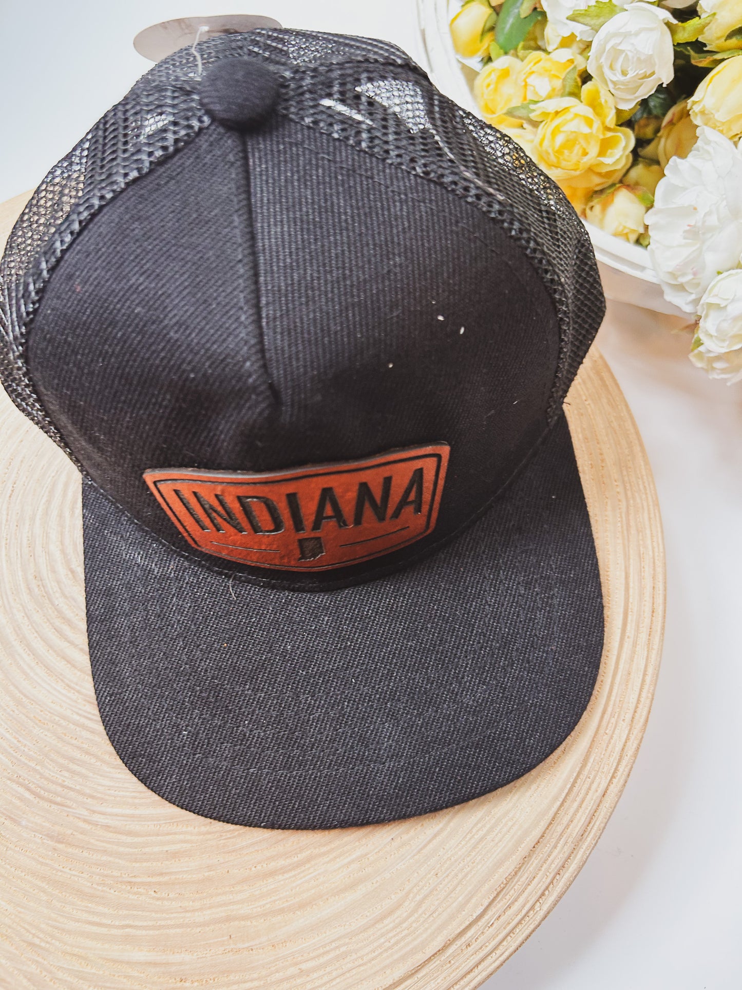 Rectangular Indiana Leather Patch on Black Trucker Hat