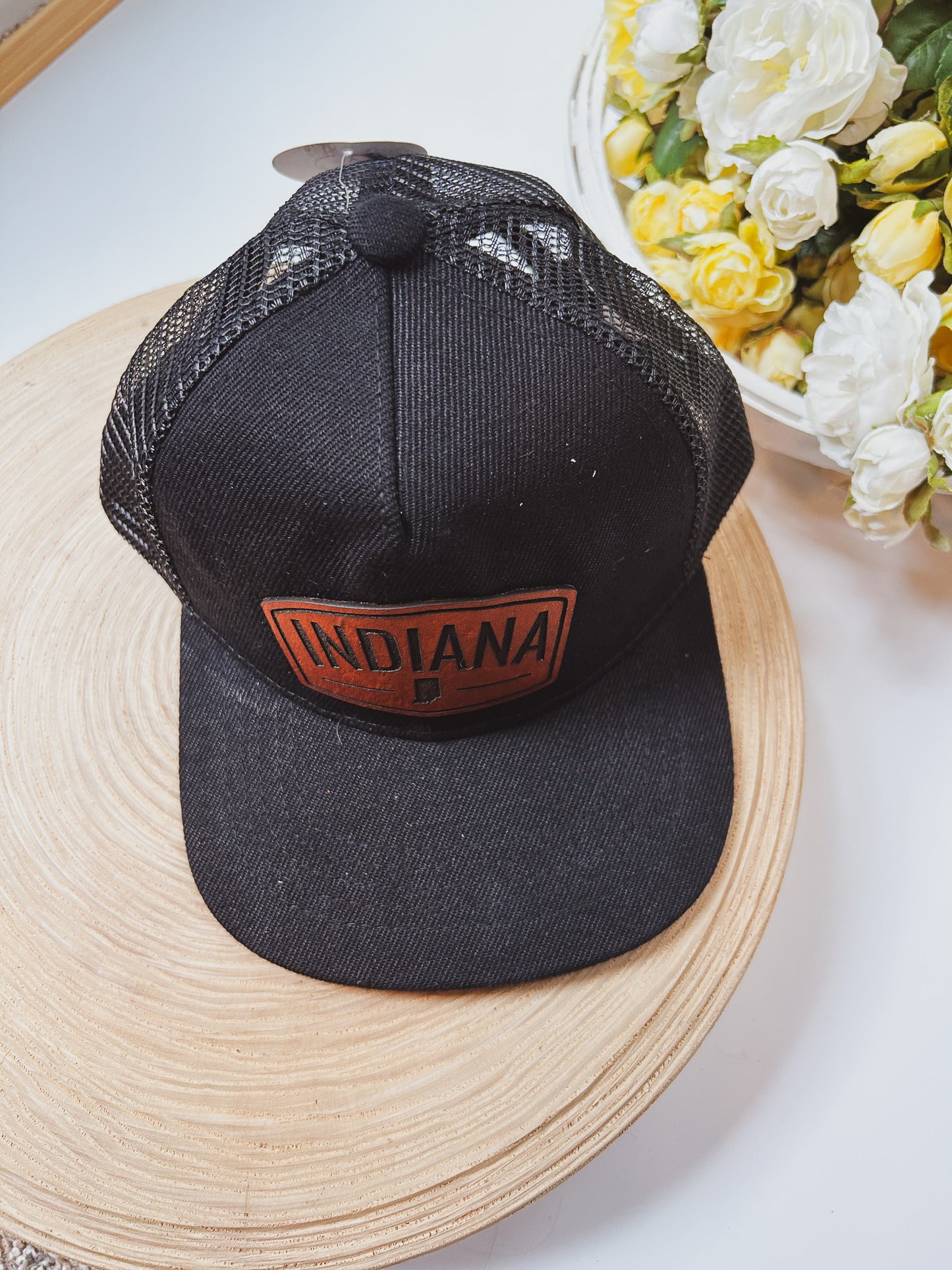 Rectangular Indiana Leather Patch on Black Trucker Hat