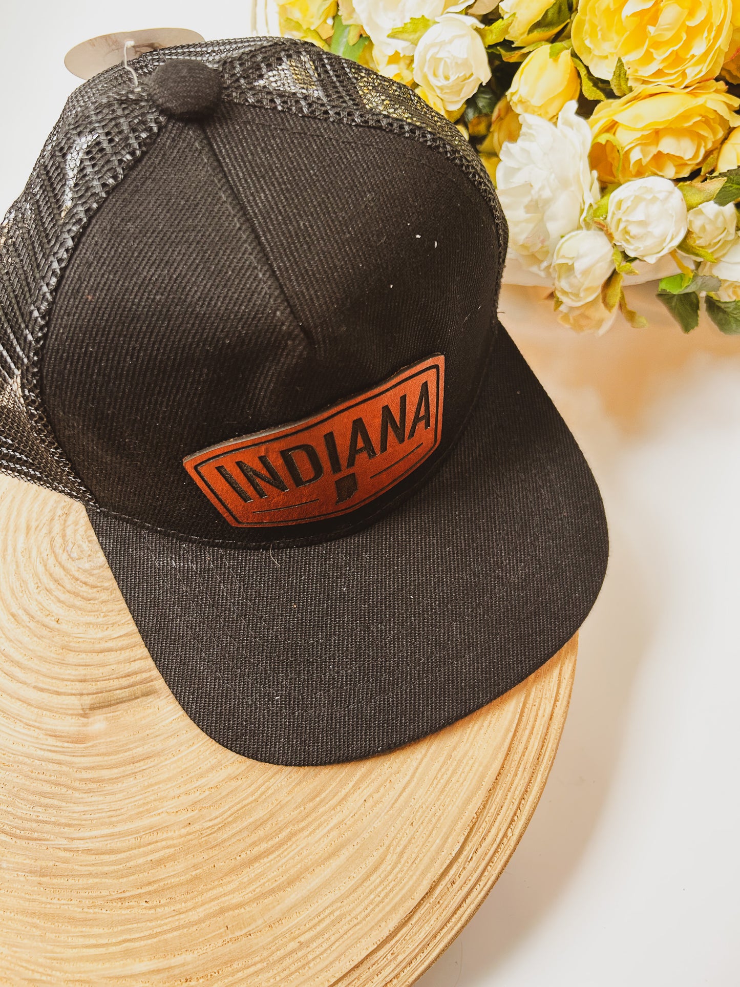 Rectangular Indiana Leather Patch on Black Trucker Hat