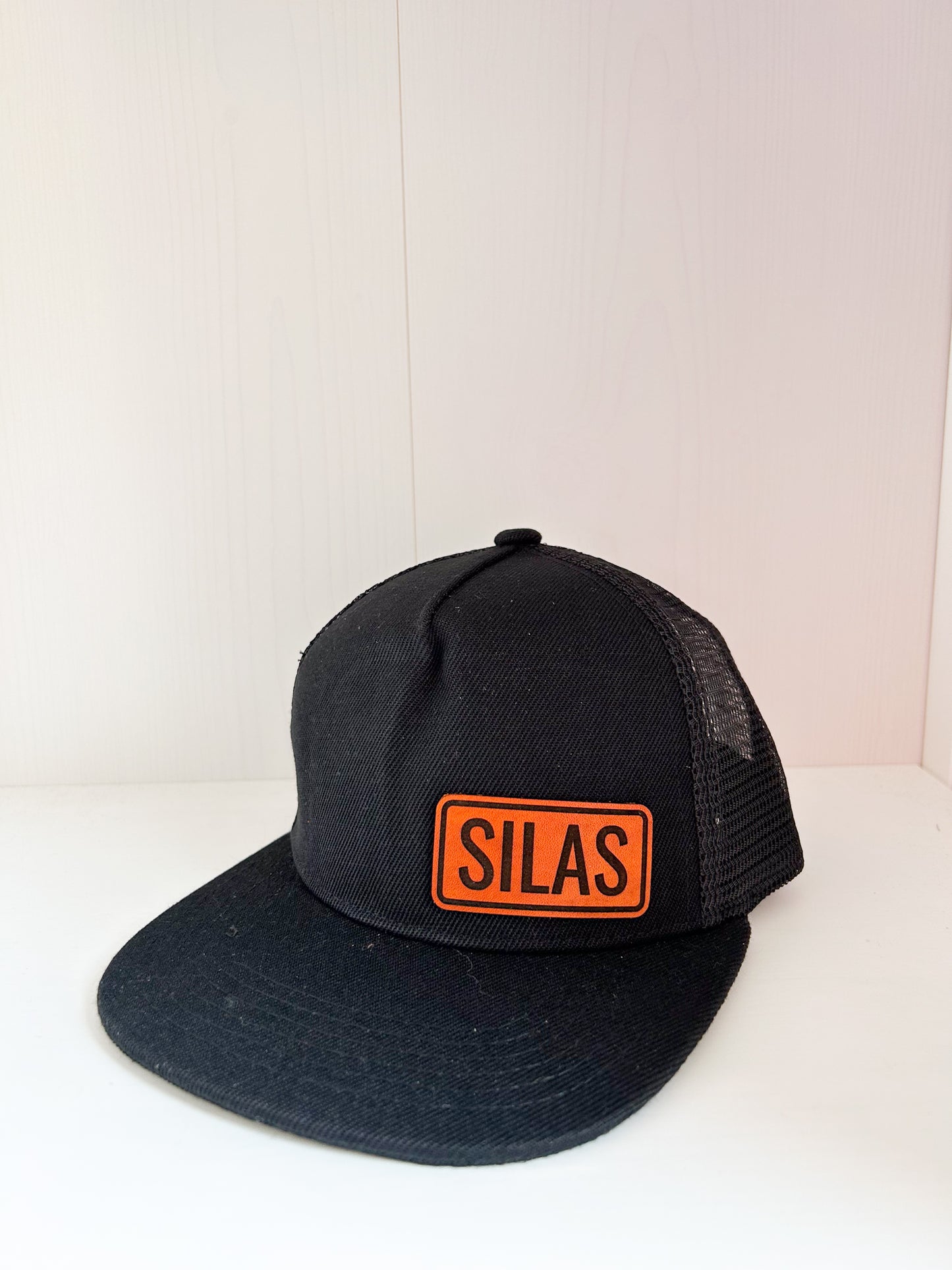 Personalized Leather Patch with Kids Name on Black Trucker Hat