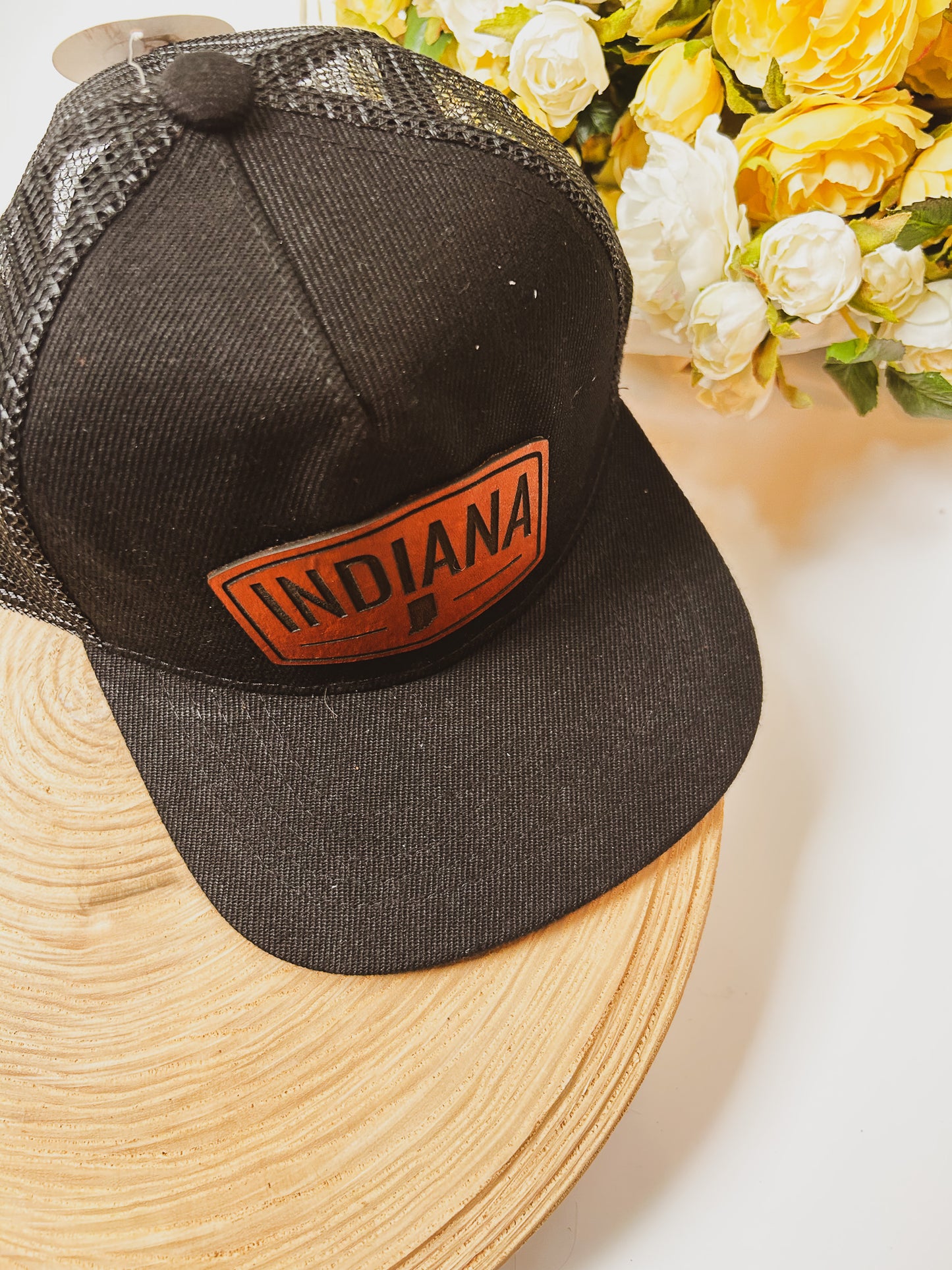 Rectangular Indiana Leather Patch on Black Trucker Hat
