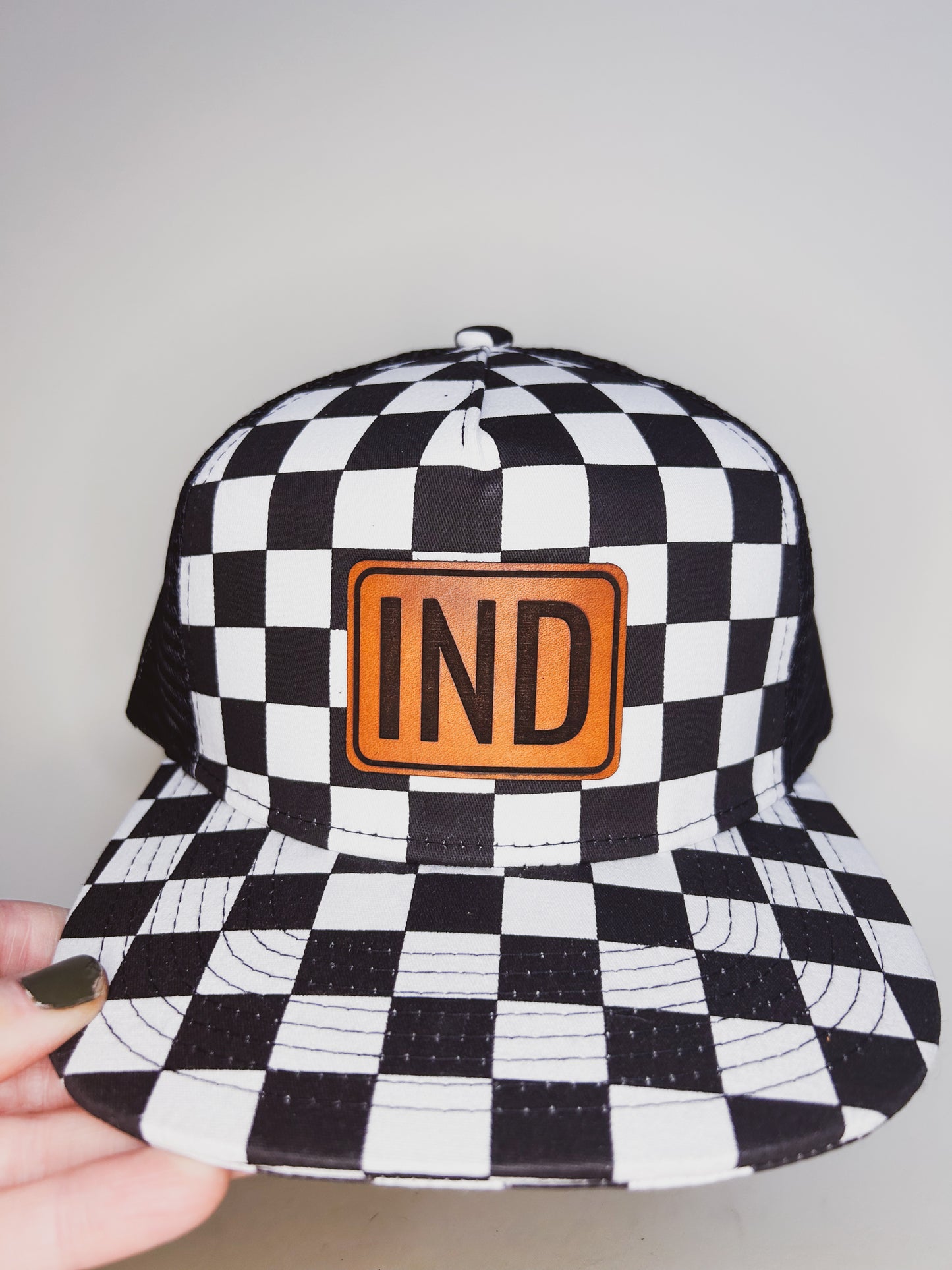 IND Patch on Checkered Trucker Hat