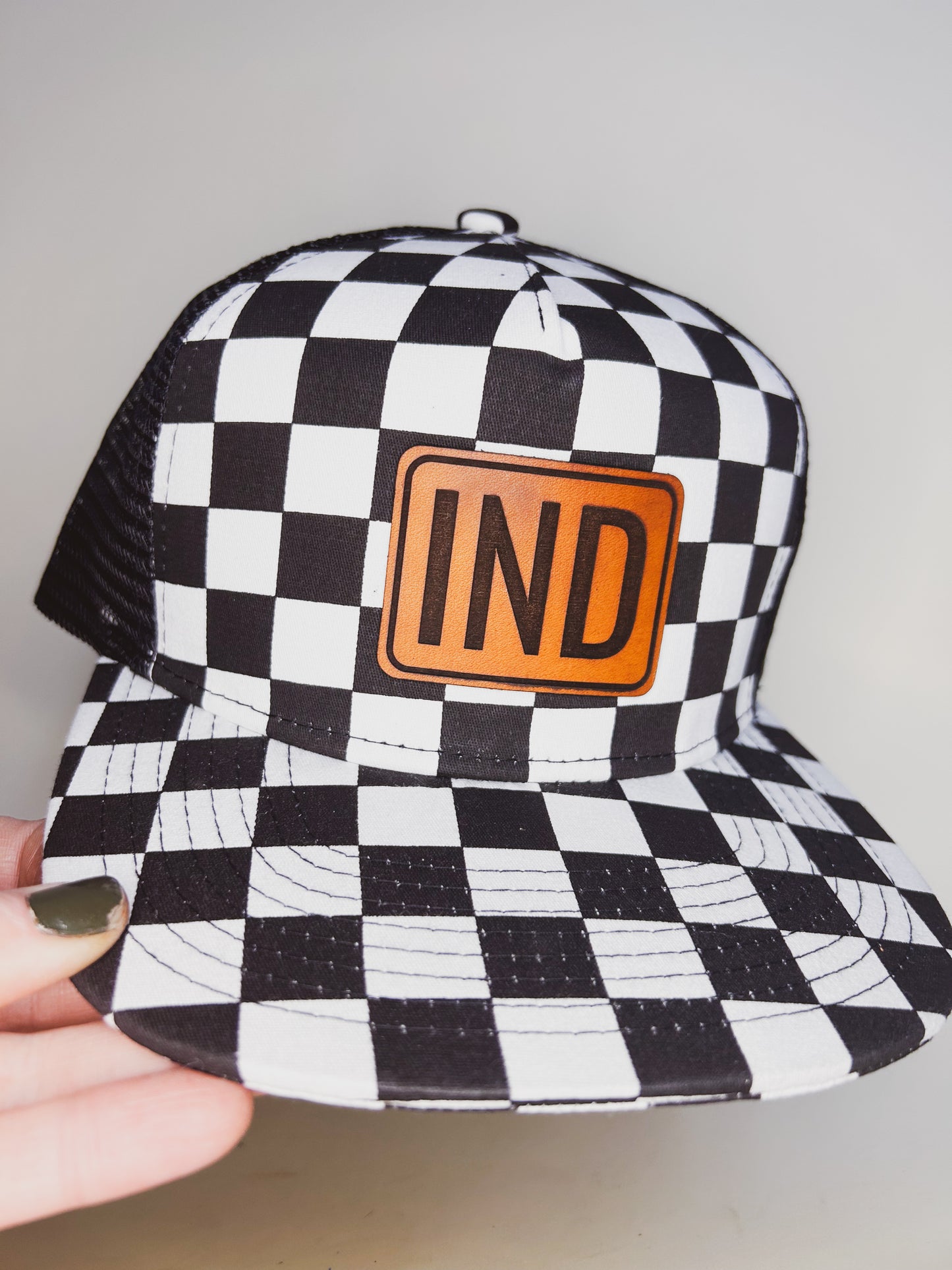 IND Patch on Checkered Trucker Hat